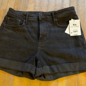 New with tags black ladies jean shorts size 8.